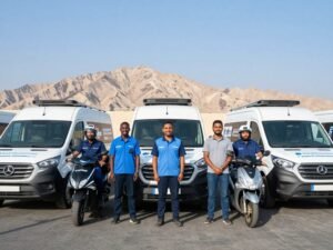 Laith Delivery team members with delivery vehicles in Ras Al Khaimah